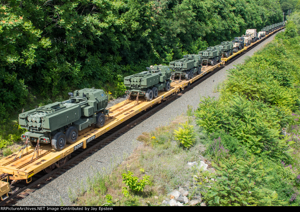 A bunch of M142 HIMARS cruise west on W863