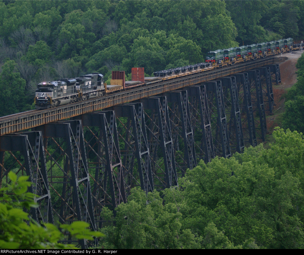 NS train 053 with export units for Pakistan starts across the James River
