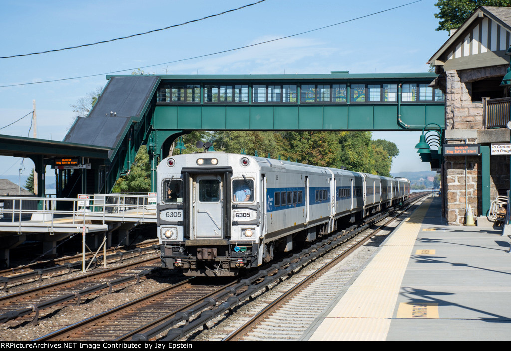 A non-stop train for the Big Apple passes on the wrong iron 