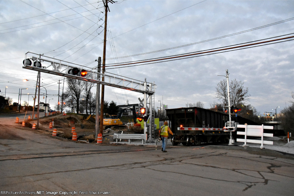 The conductor takes FRED to his place.