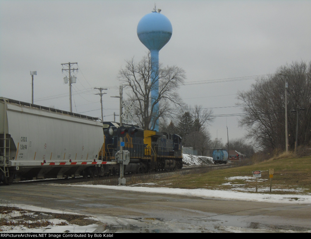 CSX 427 & 8388 heading north passing water tower