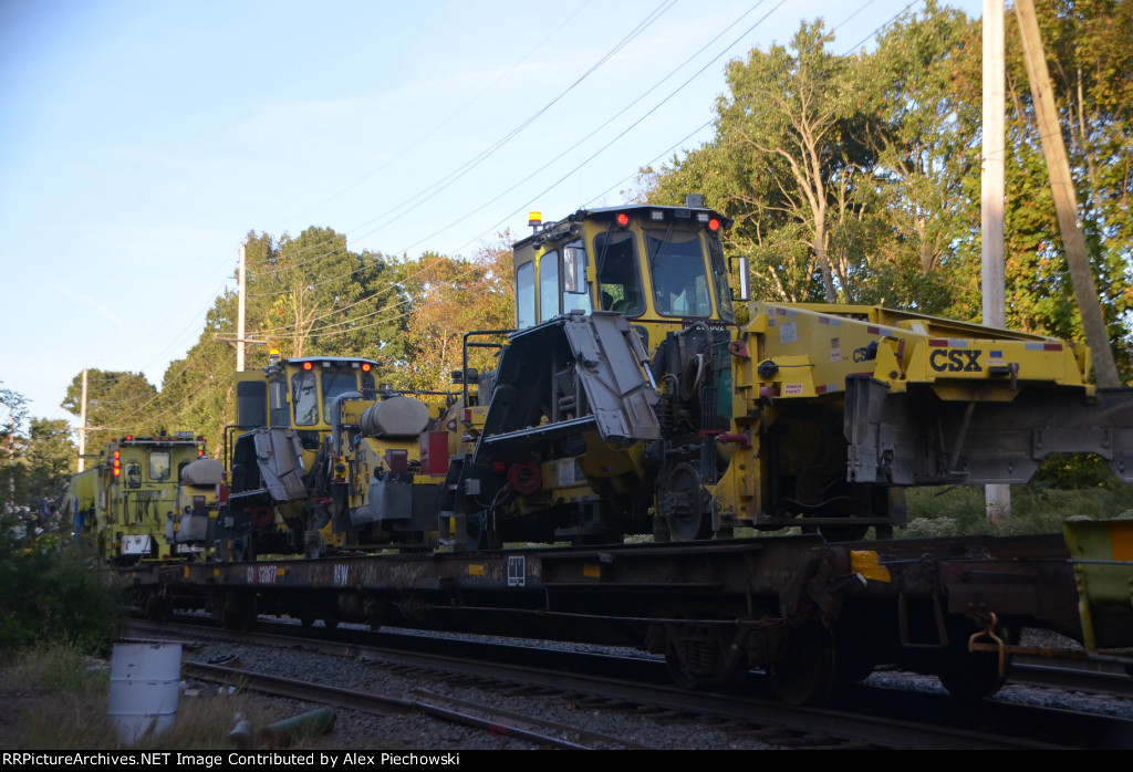 Two loaded CSX ballast regulators