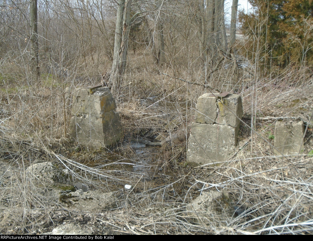 old concrete footings from old signs or building