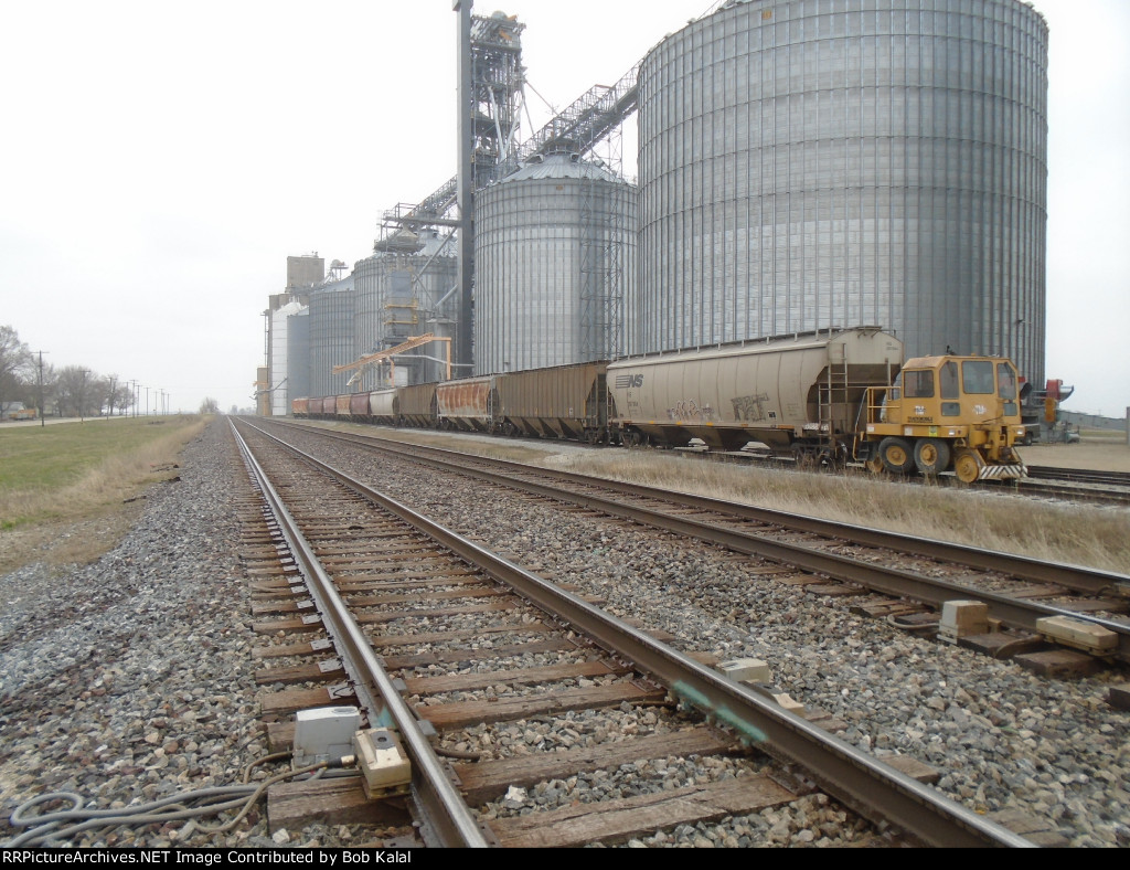West Bound Facing Trackmobile starts shoving cars east to make room for East Bound Facing Trackmobile