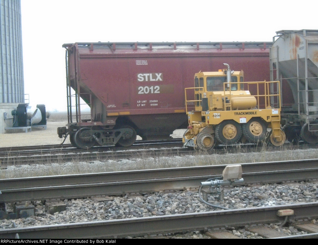  East Bound Facing Trackmobile pulling hard. These cars were already loaded & were heading for the far siding