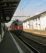 An RE 4/4 pulls into Morges with a westbound passenger train 