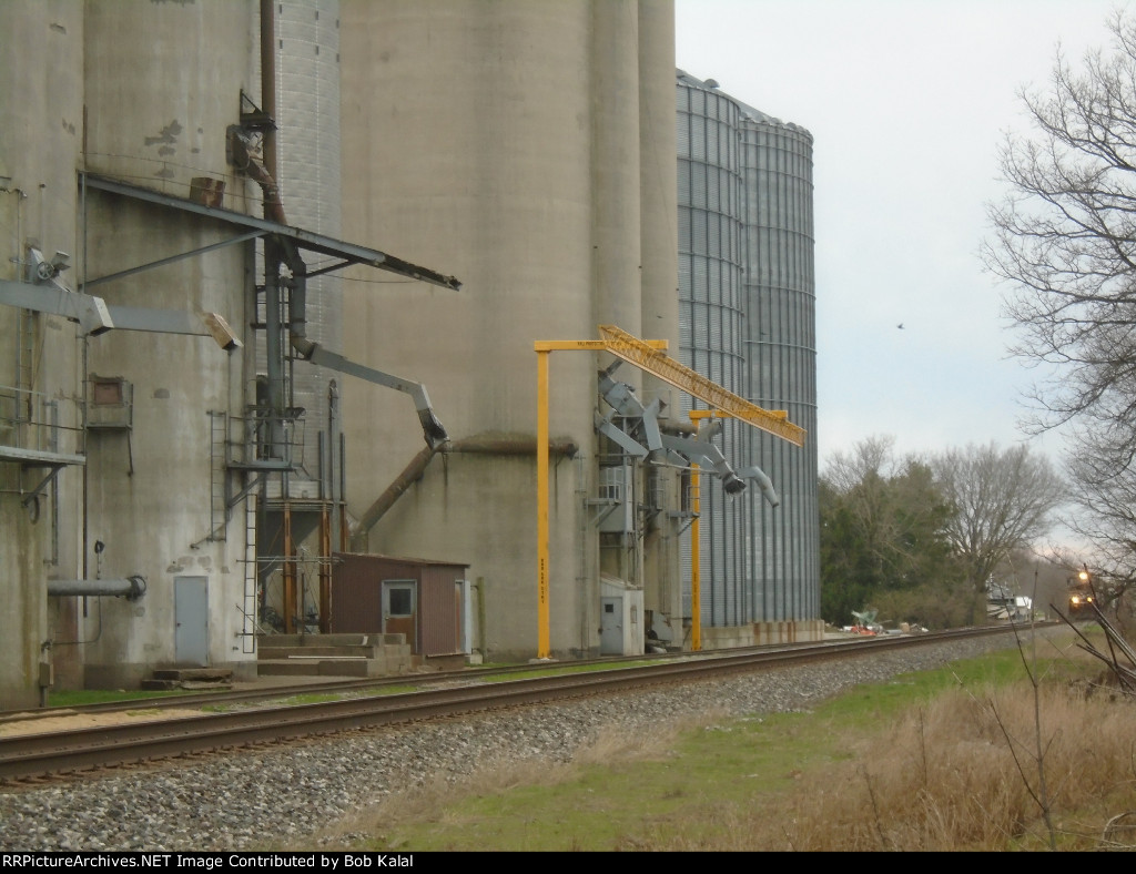 NS 4003 NS 2615 NS 2557 heading East passing Sadorus Grain Elevator