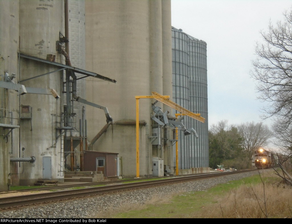 NS 4003 NS 2615 NS 2557 heading East passing Sadorus Grain Elevator