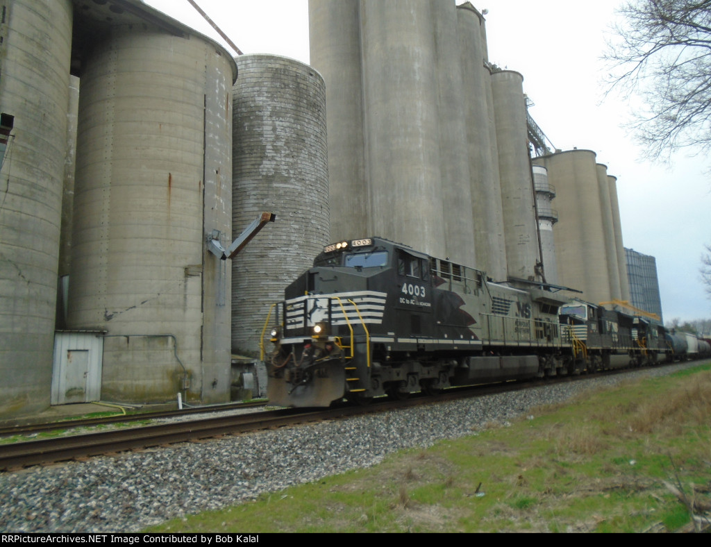 NS 4003 NS 2615 NS 2557 heading East passing Sadorus Grain Elevator
