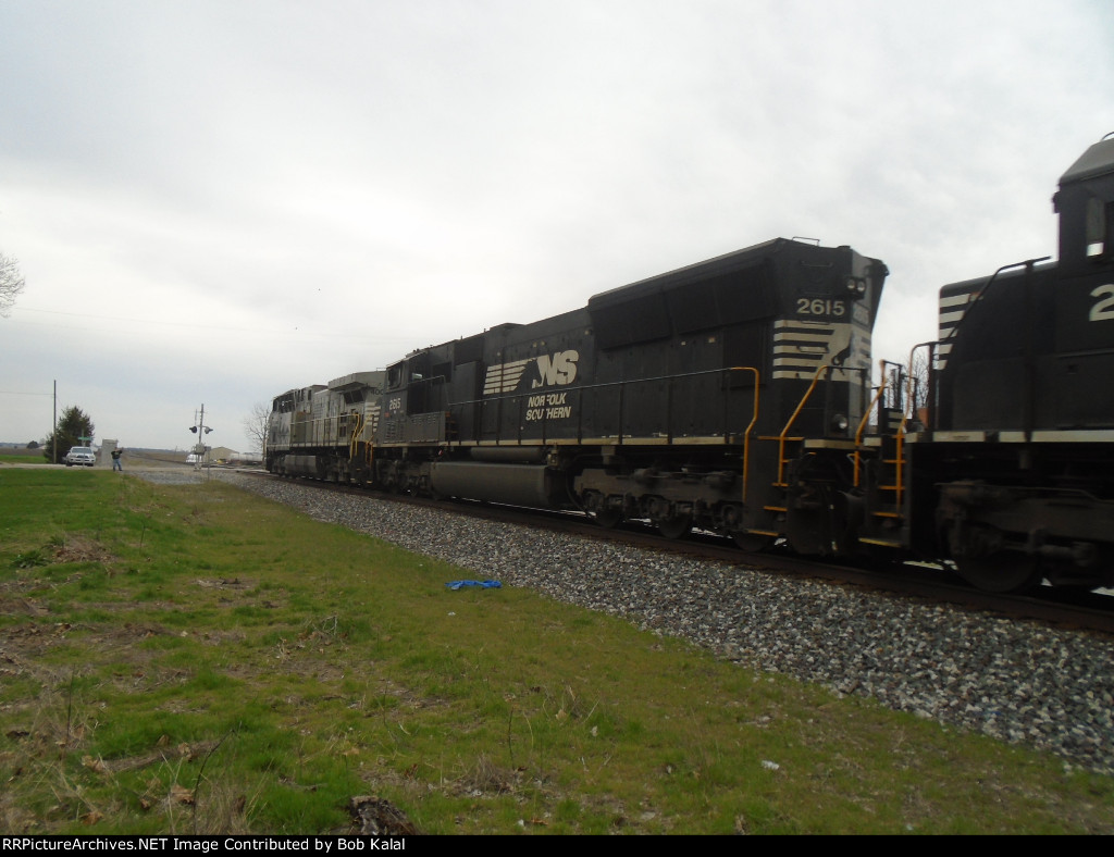 NS 4003 NS 2615 NS 2557 heading East passing Sadorus Grain Elevator