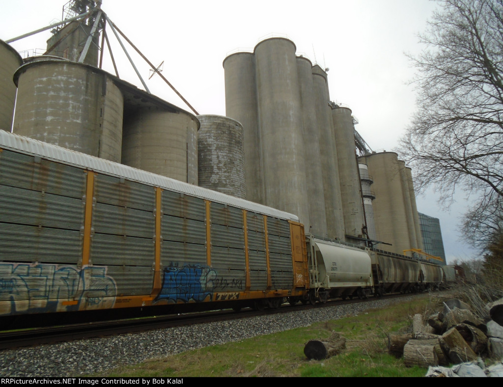 NS 4003 NS 2615 NS 2557 heading East passing Sadorus Grain Elevator
