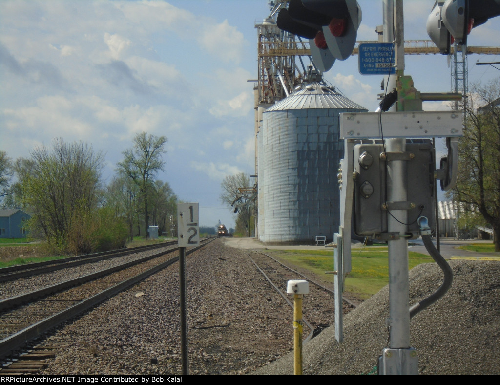  Looking South at NS 8911 & NS 7144 waiting for the go ahead & Grain Elevator