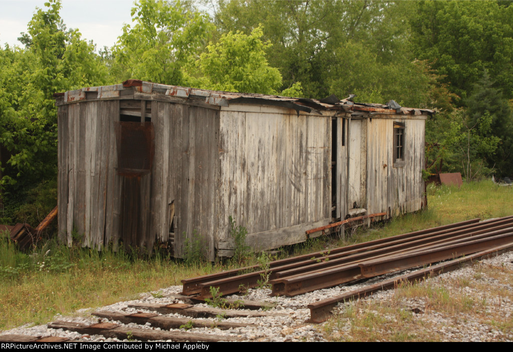 An old wooden boxcar.