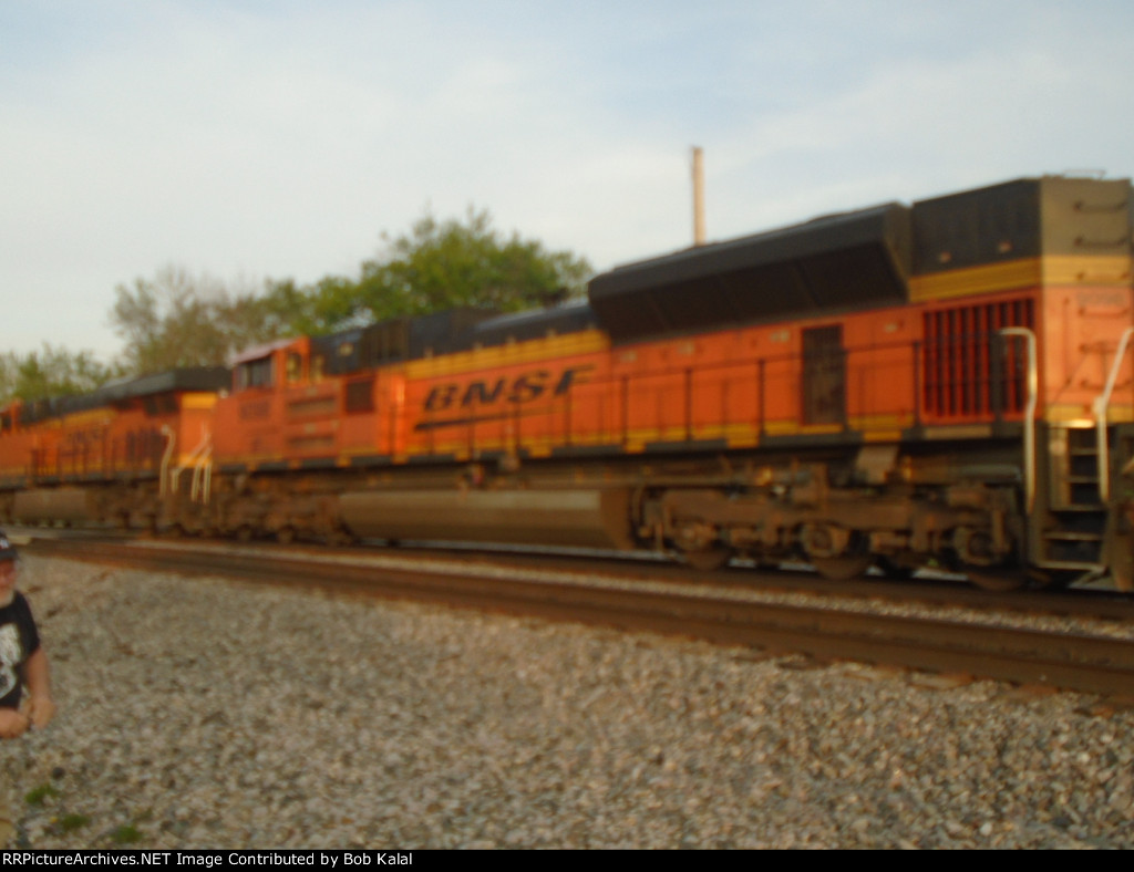 BNSF 6710 leading a stack Train East