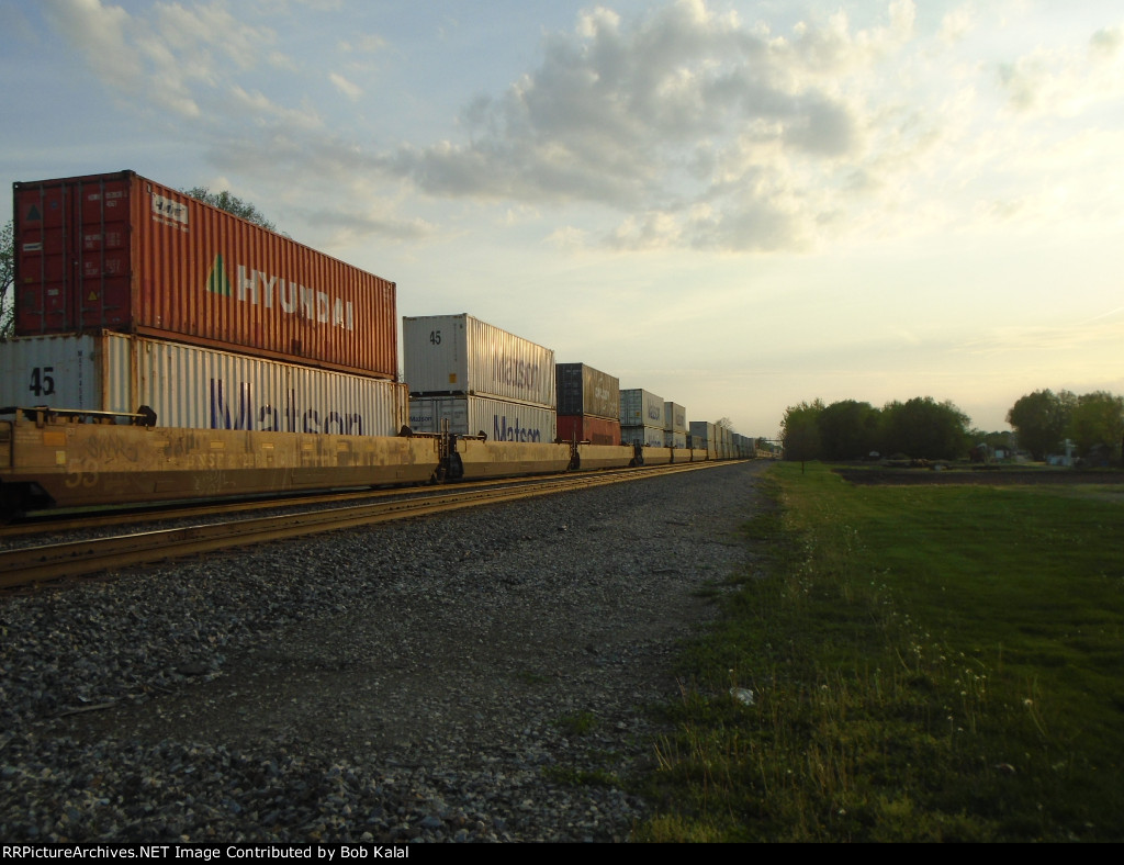 BNSF 6710 leading a stack Train East