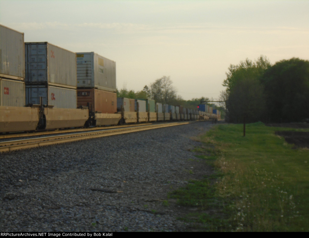 BNSF 6710 leading a stack Train East