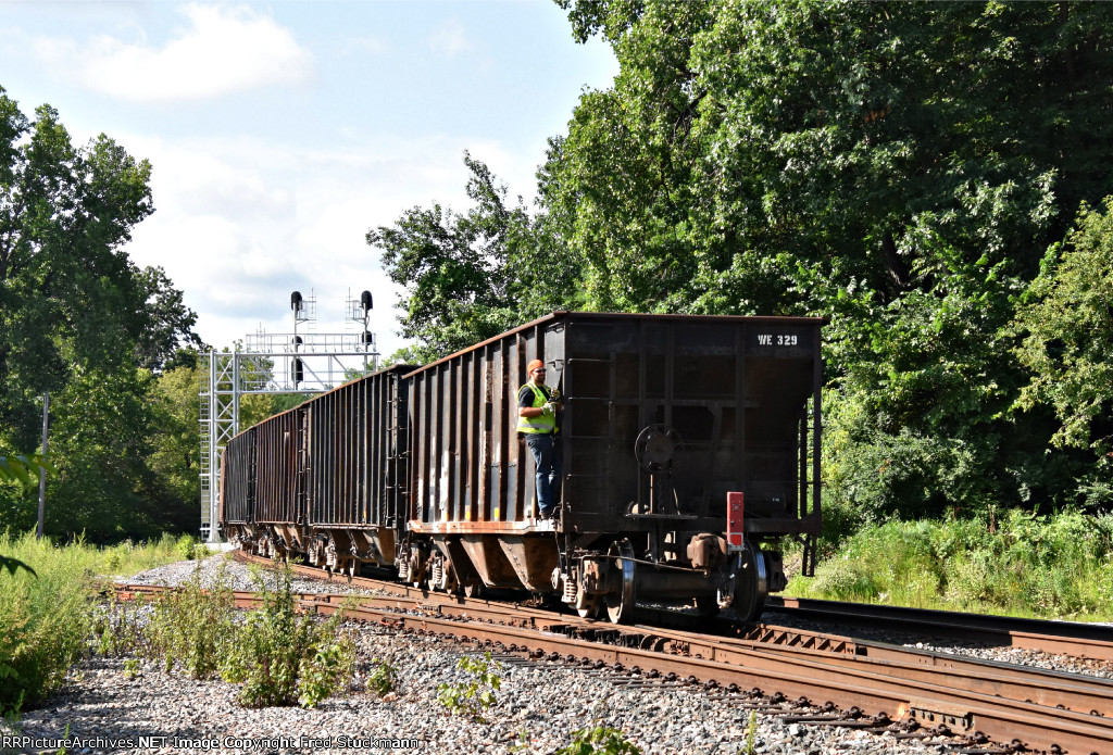 WE 329 and the conductor watch Evans Ave.
