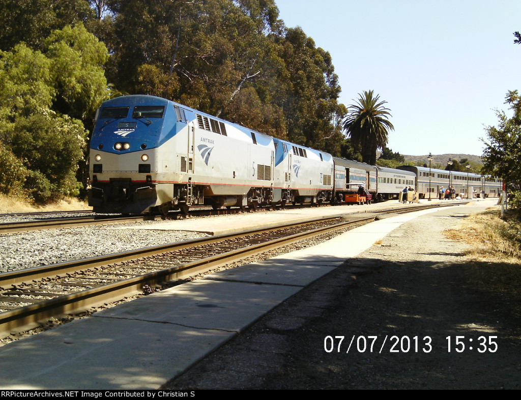 Two P42DCs with Private Railcar behind baggage car