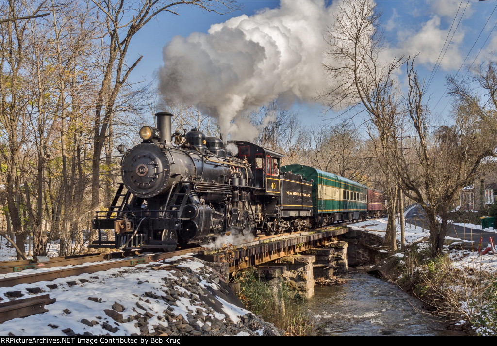New Hope & Ivyland's #40, a handsome Baldwin Consolidation crosses Aquetong Creek on the climb up out of downtown New Hope