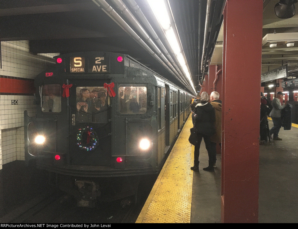NYCMTA Holiday Train arriving into 47-50th Street-Rockefeller Station heading south