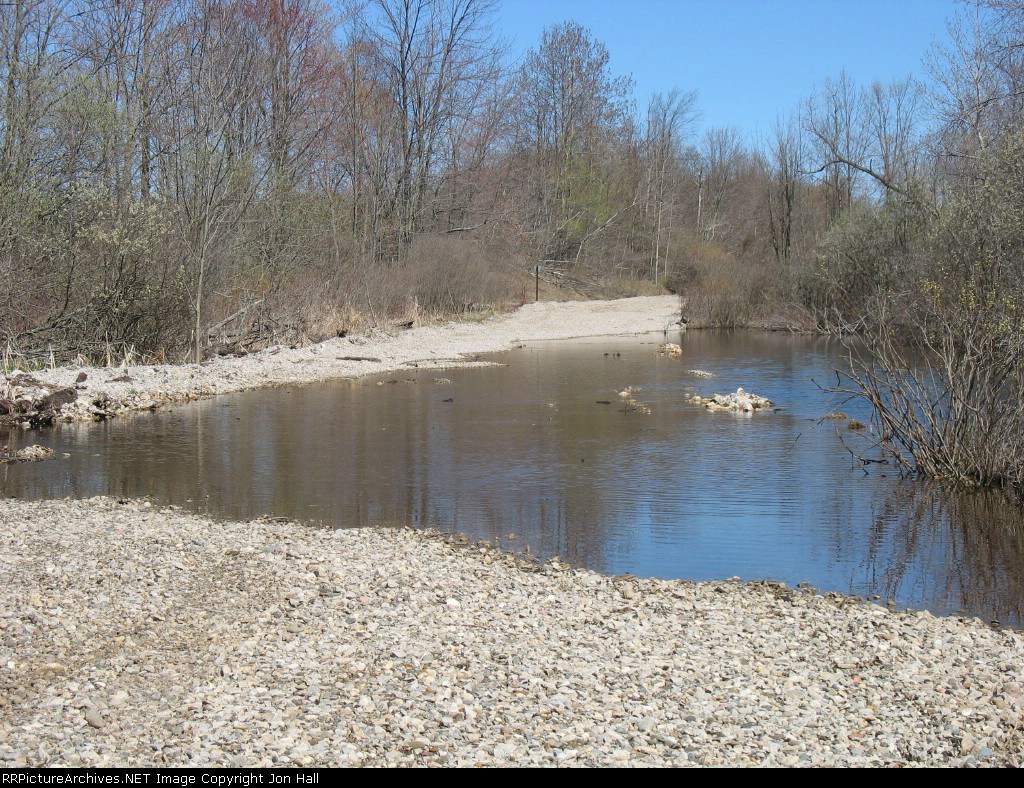 A pond has taken over the ROW