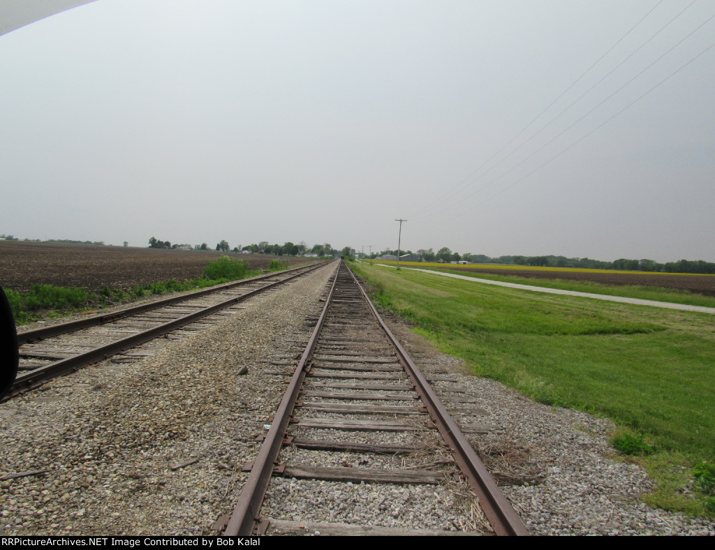 Looking West down NKP Tracks at Crossing East of Cheneyville Il. Cnty Rd 2000 E.