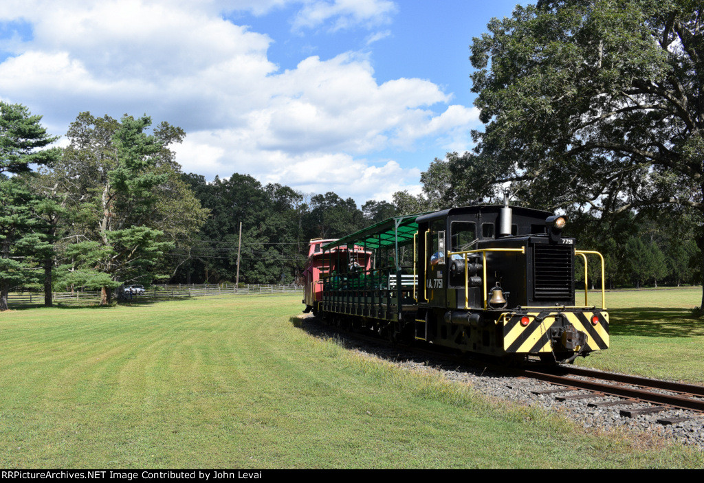 USAX Tonner # 7751 rounding the curve in the fields before entering the woods.