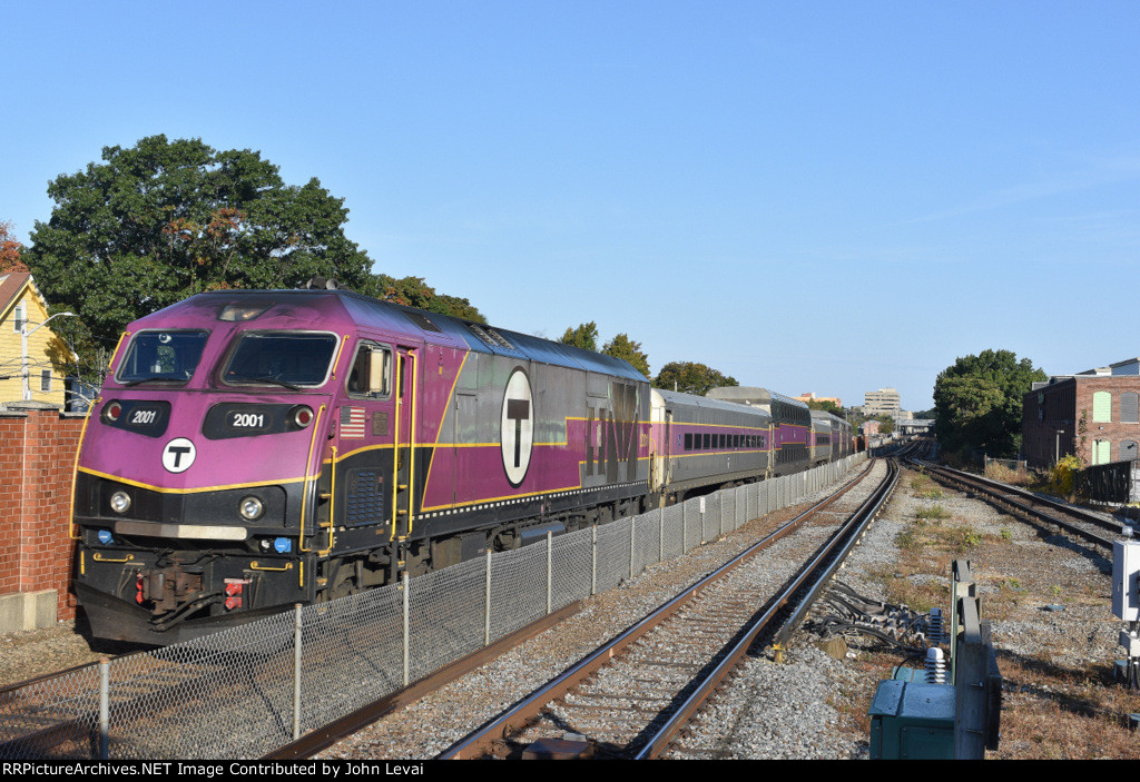 MBTA Commuter Rail passing Wollaston Station heading south