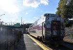 MBTA Bilevel Cab Car trailing a westbound