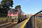 MBTA train arriving at Auburndale Station heading west