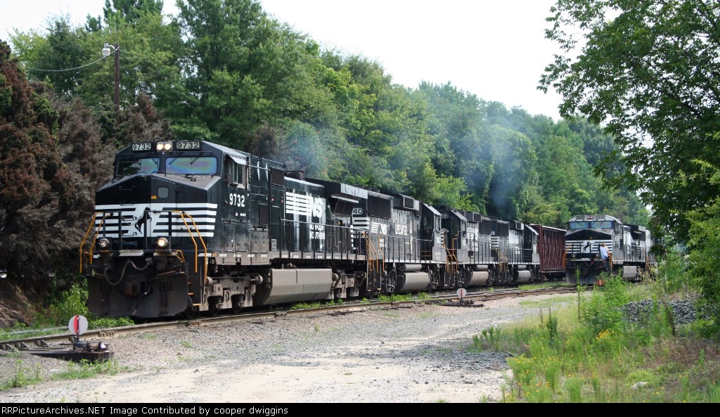 349 blasts out of Glenwood yard past a terminating P26