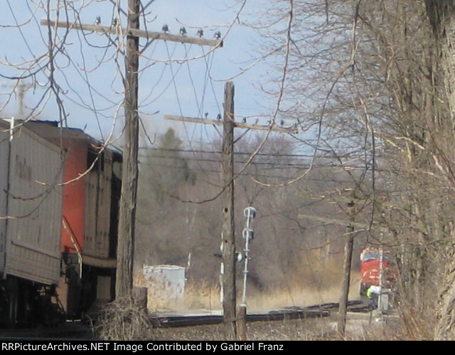 CN 2419 on Q144 North finally meets M385 SB passing the Depot into the siding!