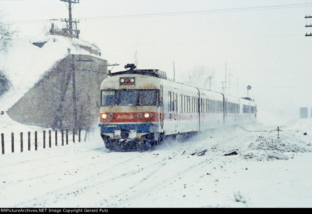 e/b Amtrak RTG turbo in snow on CMSTP&P