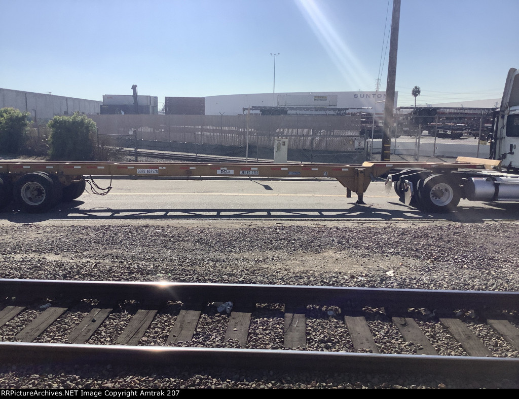 Yellow DCLI Baretable Road Chassis Passes Commerce