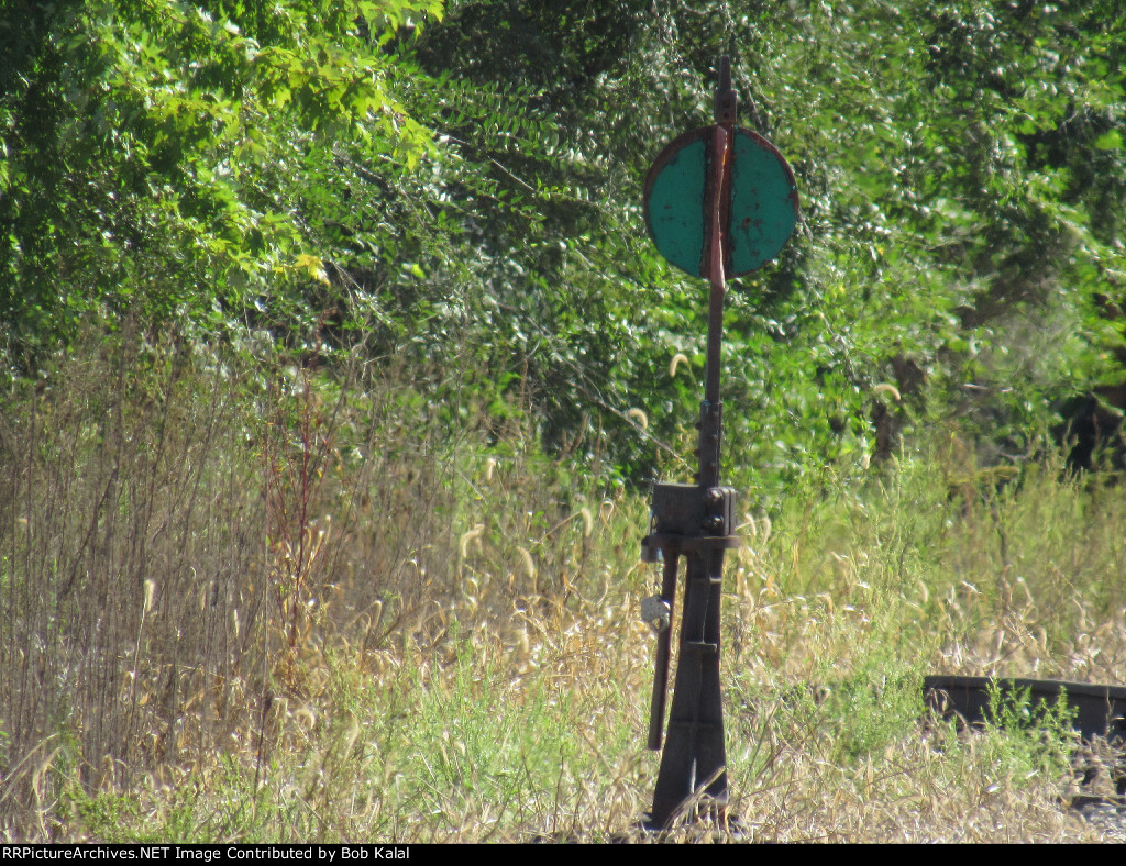 Cuba Il. 97 1st St KJR Crossing looking east at switch stand