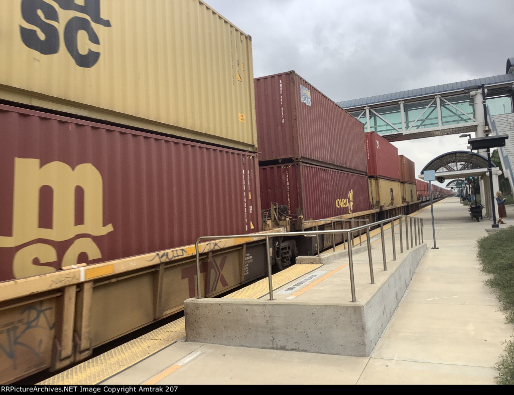 A Beacon Container and a Caru Container Passes Buena Park 