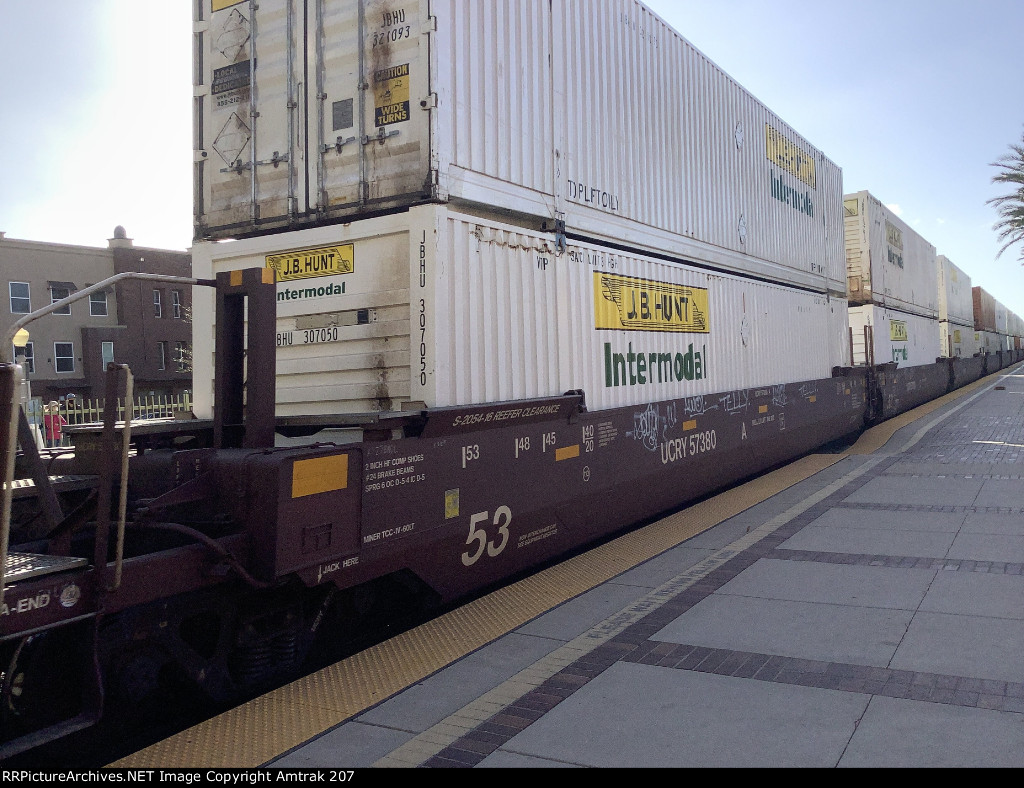 Two J.B. Hunt Containers Pass Fullerton on a Utah Central Well Car 