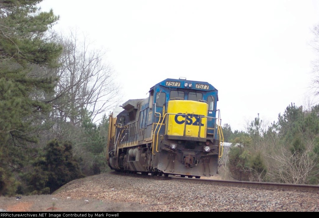CSX 7577 waiting on the main at the north end