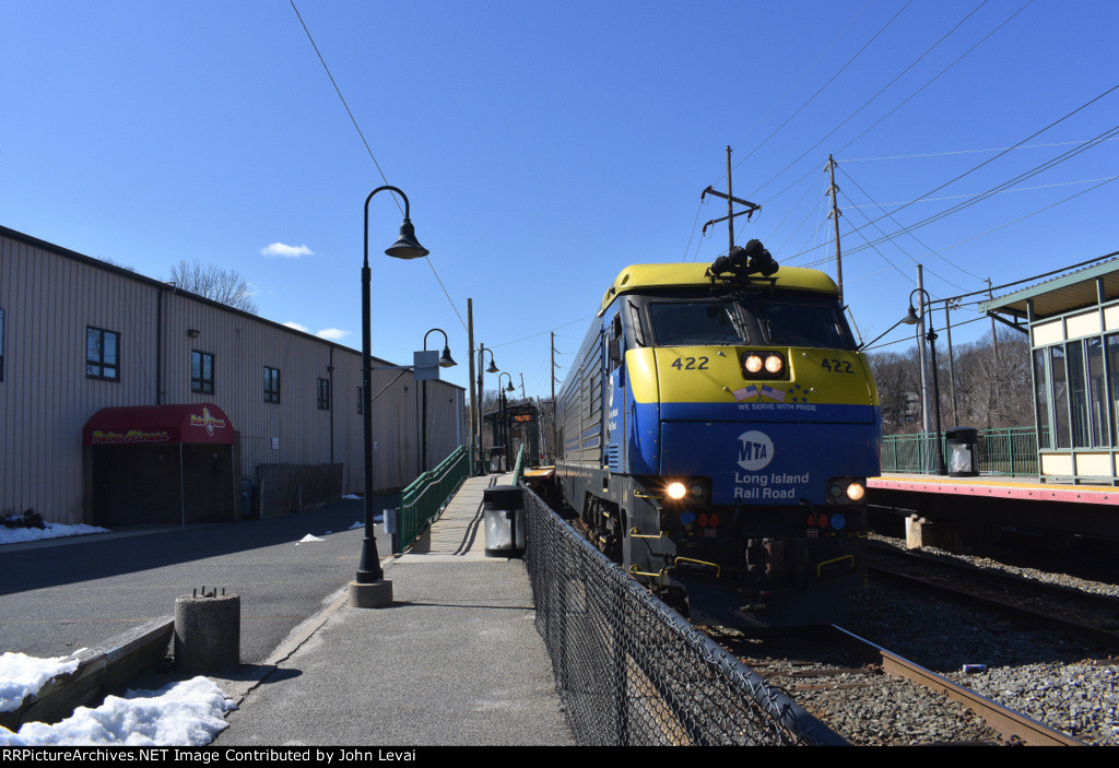 LIRR Train # 6505 behind DE30 # 422 as it is stopped at Glen Street Station in Glen Cove 