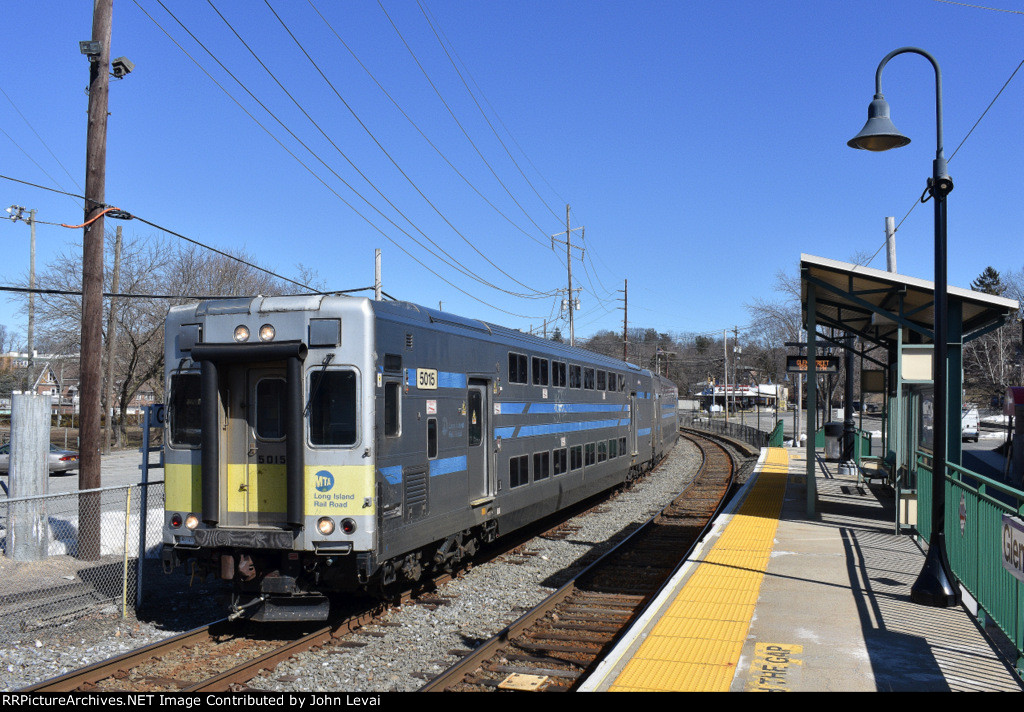 LIRR Train # 6551 is about to depart Glen Street Station 