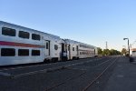 Conductor waiting to receive passengers at Garwood Station