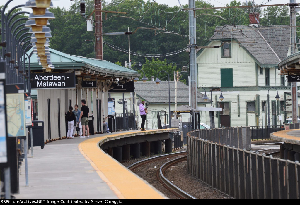 Passengers Waiting for Train 7249