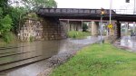 A crew was pumping out water on the other side of the bridge.