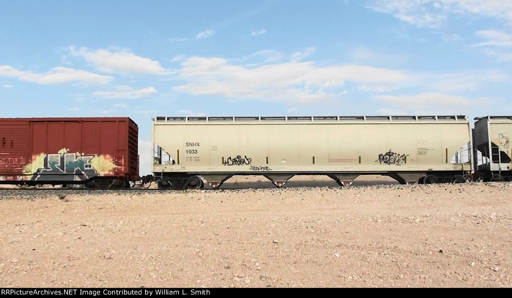 EB Manifest Frt at Erie NV W-MTrn Slvs-Pshr -75