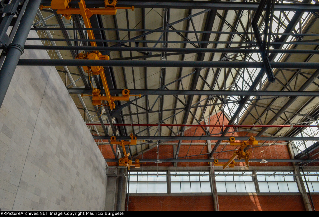 Inside Salon Trece, ceiling and cranes