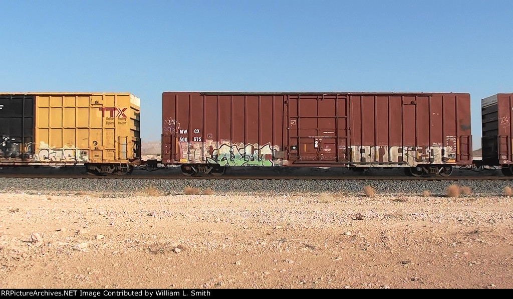 EB Manifest Frt at Erie NV W-MTrn-Slvs-Psh -90