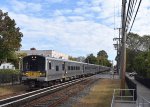 Westbound LIRR Train # 6721, with an M7 Set, slows for the station stop at Garden City