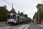 Westbound LIRR M9 Set approaching Nassau Blvd Station