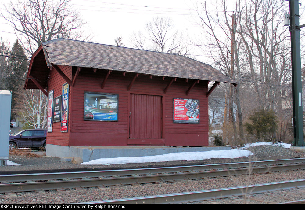 This small structure at Lorraine Ave, was the former Erie (later E-L) freight house in town, adjacent to the passenger station