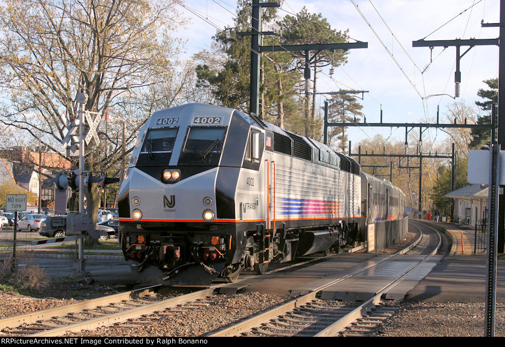 Mor modern power in the form of this PL42AC pauses at the station before heading west